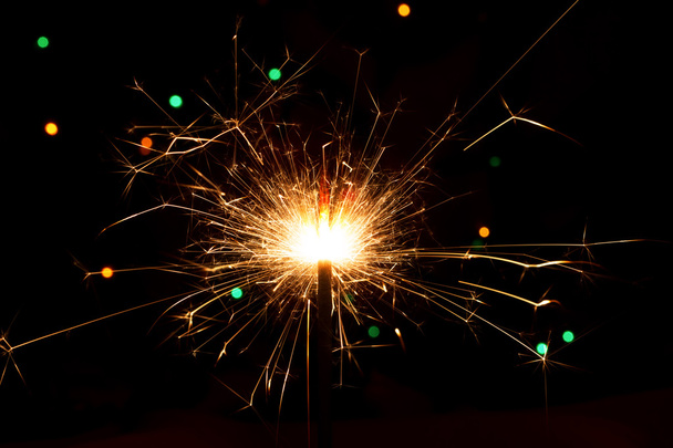Burning festive sparkler - Photo, image
