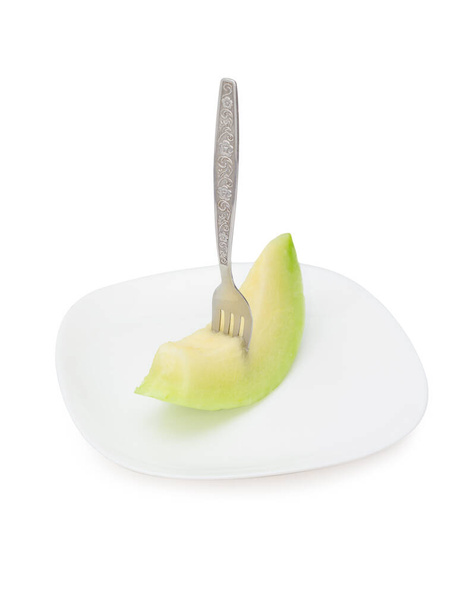 cantaloupe melon fruit in dish Isolated on white background - Фото, изображение
