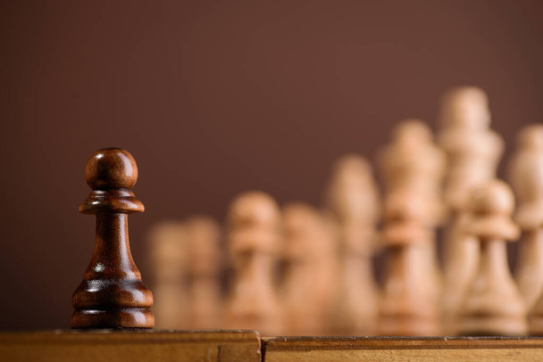 close up of chess piece pawn on chessboard  - Fotografie, Obrázek