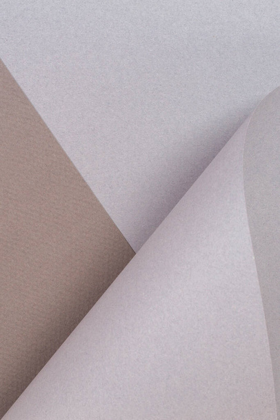 Absztrakt geometrikus alak szürke barna színű papír háttér - Fotó, kép