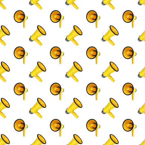 Seamless pattern of yellow megaphones on white background isolated, loudspeakers art backdrop, loudhailers repeating ornament wallpaper, announce or advertisement symbol, media, communication sign - Photo, Image