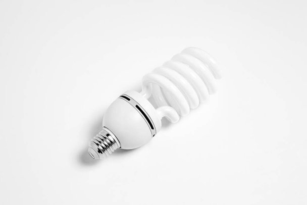 Fluorescent light bulb isolated on white background. Led lamp. High-resolution photo. - Photo, Image