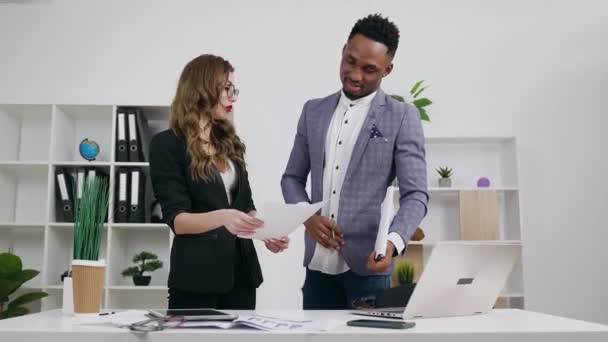 Business concept where good-looking satisfied contented multiracial business people signing the contract after agreemant all details and hand shaking in the office,4k - Πλάνα, βίντεο