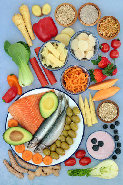 Food to ease irritable bowel syndrome. Healthy foods high in antioxidants, protein, dietary fiber, vitamins, minerals, smart carbs, omega 3 & anthocyanins. Flat lay. - Photo, Image