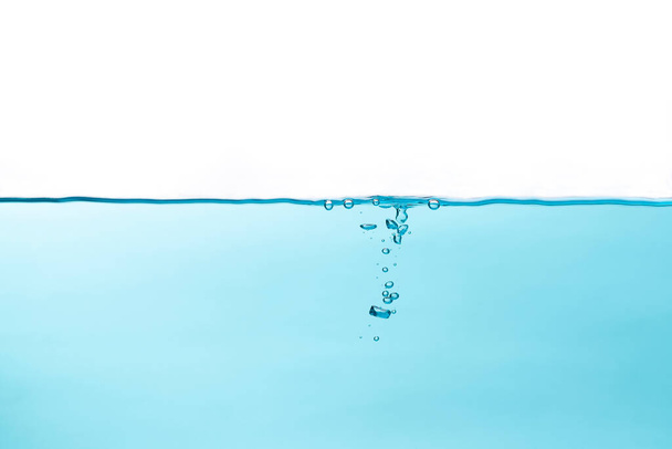 Close up of air bubble and water splash,Water splash isolated on white background - Valokuva, kuva