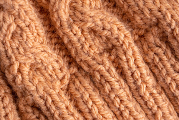 Motif en laine tricoté à la main. Laine orange tricot texture fond, texture à la main
 - Photo, image