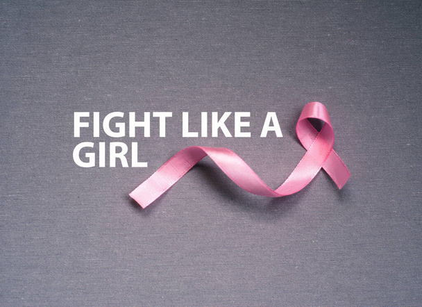 Ροζ κορδέλα, σύμβολο του καρκίνου του μαστού, μήνας ευαισθητοποίησης του καρκίνου.  - Φωτογραφία, εικόνα
