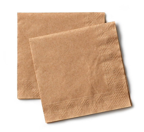 two brown paper napkins isolated on white background, top view - Photo, Image