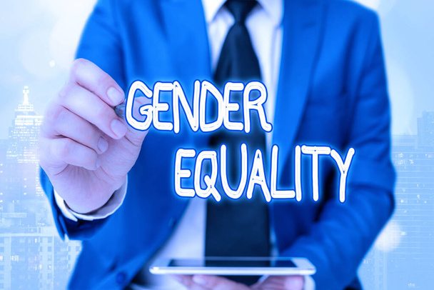 Tekst schrijven Gendergelijkheid. Bedrijfsconcept voor toegang tot hetzelfde voorrecht voor zowel mannen als vrouwen. - Foto, afbeelding