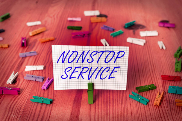 Handschrift tekst Nonstop Service. Concept betekent systeem van openbare behoeften die voortdurend beschikbaar worden gesteld. - Foto, afbeelding