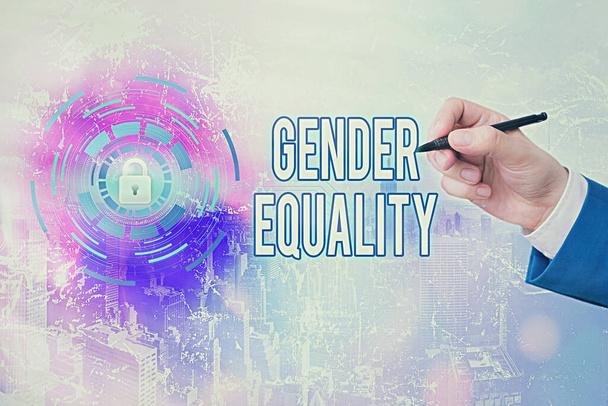 Escritura a mano de texto Igualdad de género. Concepto que significa acceso al mismo privilegio otorgado tanto a hombres como a mujeres
. - Foto, imagen