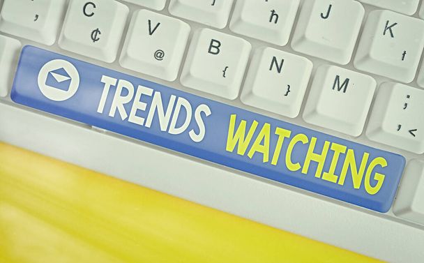 Text sign showing Trends Watching. Conceptual photo a business firm that usually engages and dominates the market. - Photo, Image