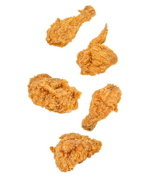 Falling of Fried chicken isolated on white background. - Photo, Image