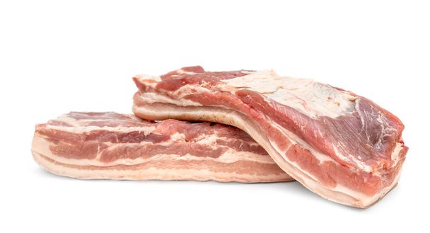 Dos trozos de carne de cerdo cruda sobre fondo blanco. Carne cruda
. - Foto, Imagen