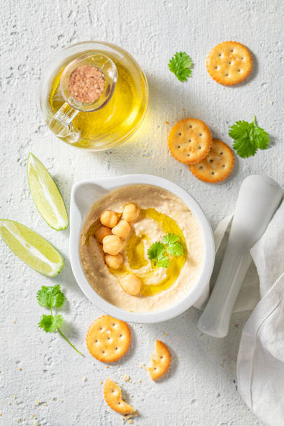 Enjoy your hummus made of fresh chickpeas and oil - Фото, зображення