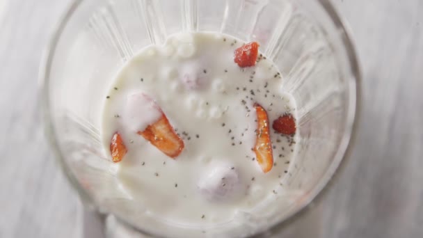fresh strawberry yogurt in glass blender  - Imágenes, Vídeo