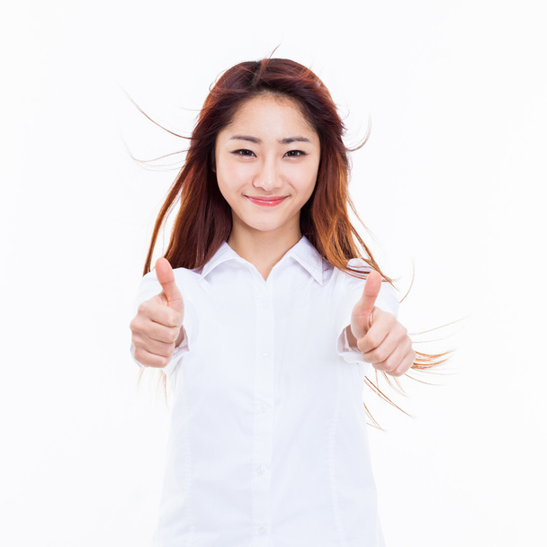 Young Asian woman showing thumb. - Photo, Image
