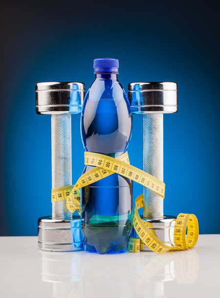fitness dumbbells and bottle of water - Fotoğraf, Görsel