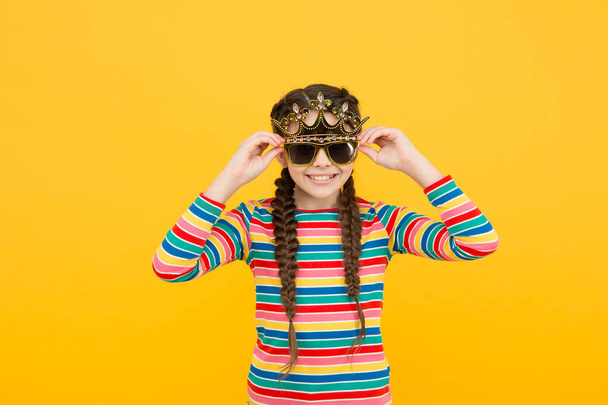Looking amazing as stylish girl. Happy girl wear crown and glasses. Child girl with party props. Beauty look of little girl. Beauty pageant. Fashion accessories. Hair salon. Too pretty to care - Fotoğraf, Görsel