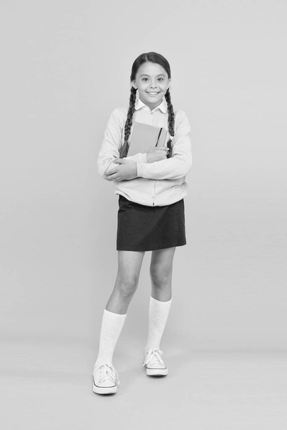 Focused on education. KId girl diligent student likes to study. Study in secondary school. Homeschooling and private lesson. Adorable child schoolgirl. Formal education. School education basics - Foto, imagen