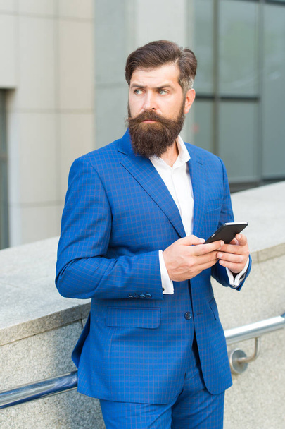 Talent of managing. Online business. Bearded man with smartphone. Businessman send sms using smartphone. Send message. Audio message service. Text messaging. Mobile communication. Email message - Фото, зображення