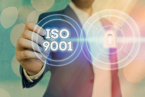 Word writing text Iso 9001. Business concept for the appropriate international standard followed to ensure customer s is requirement. - Photo, Image