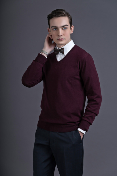 Retro fifties english style fashion young man. Wearing dark red - Photo, Image