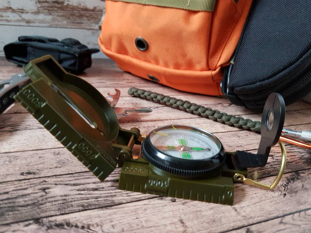 Compass and backpack for hiking - Фото, зображення
