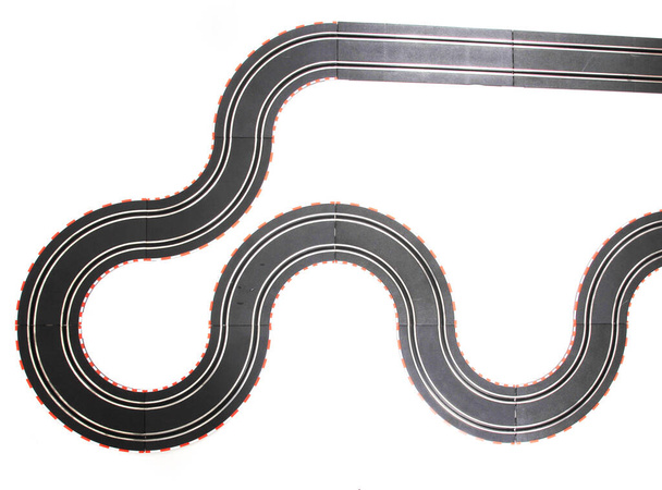 juguete pista de carreras de coches aislado en el fondo blanco
 - Foto, Imagen