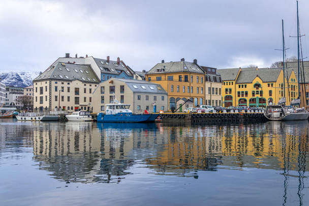 Colorful old houses in art nouveau in Alesund at the Norwegian Sea - Photo, Image