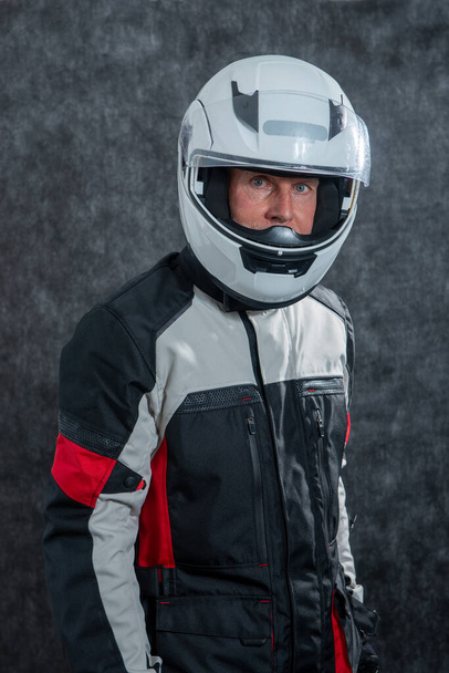 a portrait of senior biker with white helmet - Φωτογραφία, εικόνα