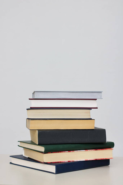 Stack of books on white background - Fotó, kép