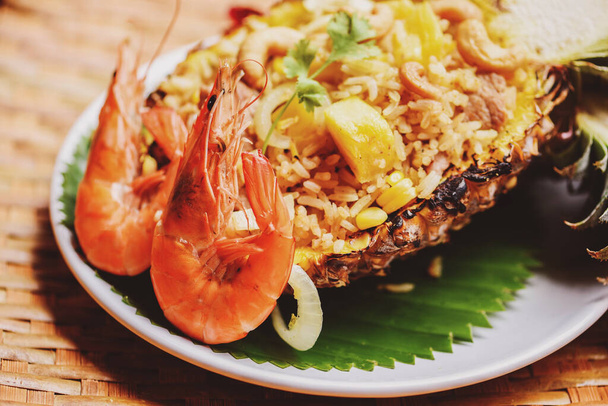 delicious menu shrimps prawns cooked / fried rice shrimp and fruits pineapple on plate asian food in thai - Photo, Image