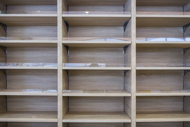 Built-in wooden shelf in store, empty - Photo, Image