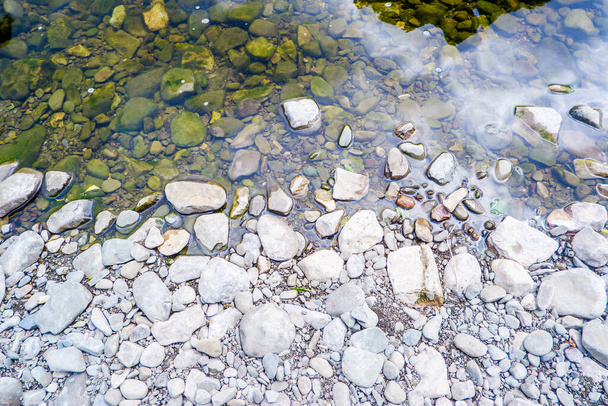 Horizontal background of pebbles and rivers edge - Photo, Image