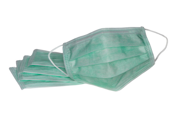 Зелена маска для медичного використання, білий фон, маска для носіння для запобігання мікробів
 - Фото, зображення