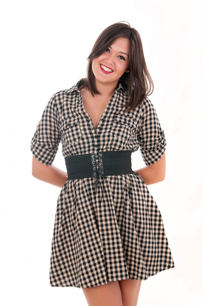 Girl in a checkered dress - Foto, afbeelding