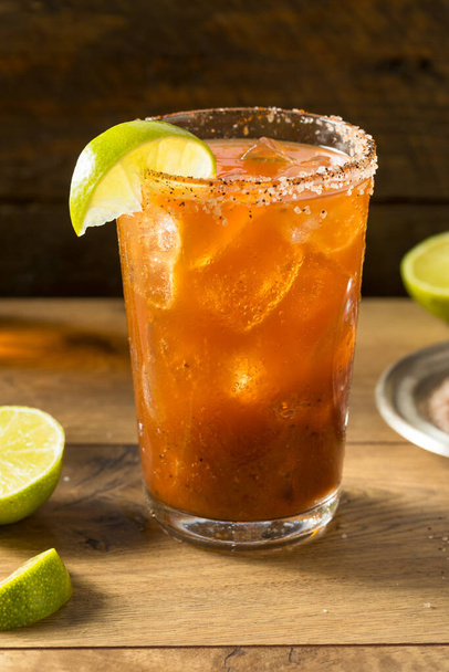 Homemade Mexican Michelada Beer Cocktail with Lime - Foto, immagini
