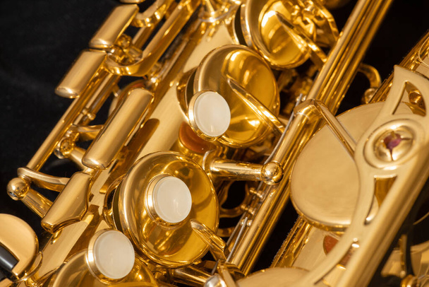 alto saxophone closeup, instrument valve, macro details, musical instrument background - Φωτογραφία, εικόνα