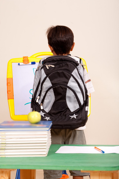 Rear view of a smart school kid - Photo, Image