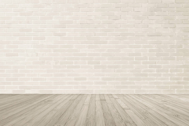 Cremebraune Ziegelwand strukturierten Hintergrund mit Holzboden in Sepiabraun für den Innenbereich - Foto, Bild