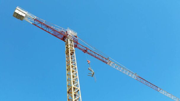 Construction site in spring - crane and scaffolding - Photo, Image