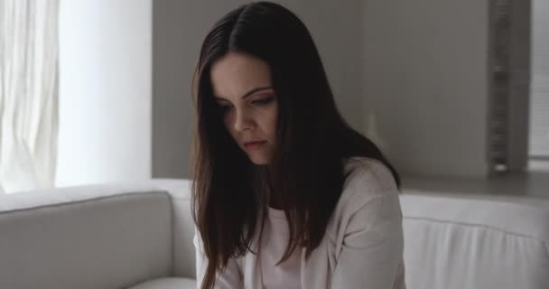 Depressed upset young woman suffering from headache. - Záběry, video