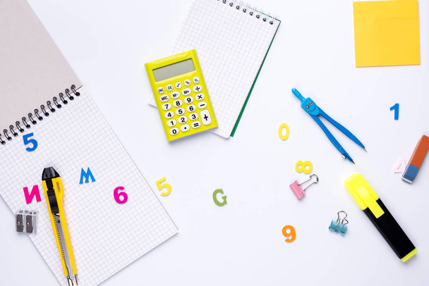 Many different school supplies on white copy space background. Back to school concept. - Fotografie, Obrázek