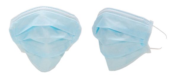 Dos máscaras protectoras azules de la cara del hospital juntas, una vista frontal, una vista lateral que muestra correas, aisladas contra fondo blanco
 - Foto, Imagen