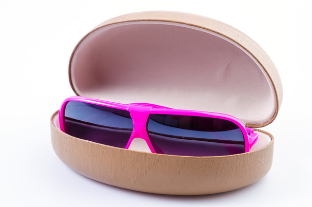 рожевий сонцезахисні окуляри
 - Фото, зображення