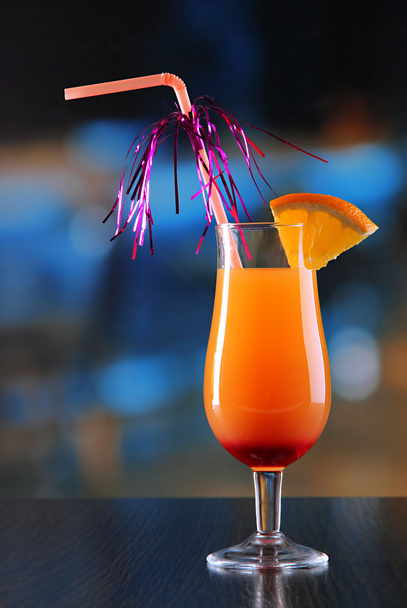 Glass of tasty cocktail on bright background - 写真・画像
