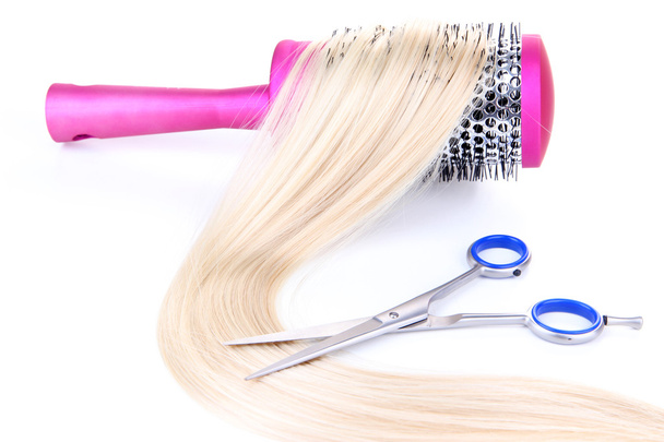 Long blond hair with hairbrush and scissors isolated on white - Foto, Imagem