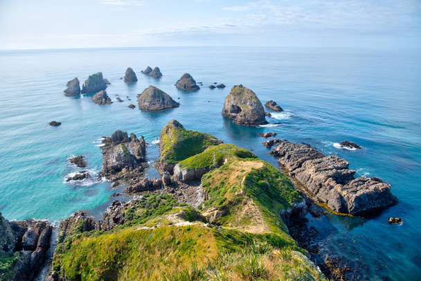 The nuggets - rocky islets at Nugget point in New Zealand - Foto, Imagen