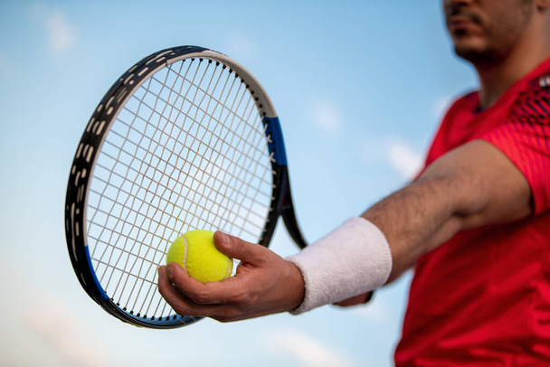 Tennis player focused in ready position.He is on tennis court. - Photo, Image